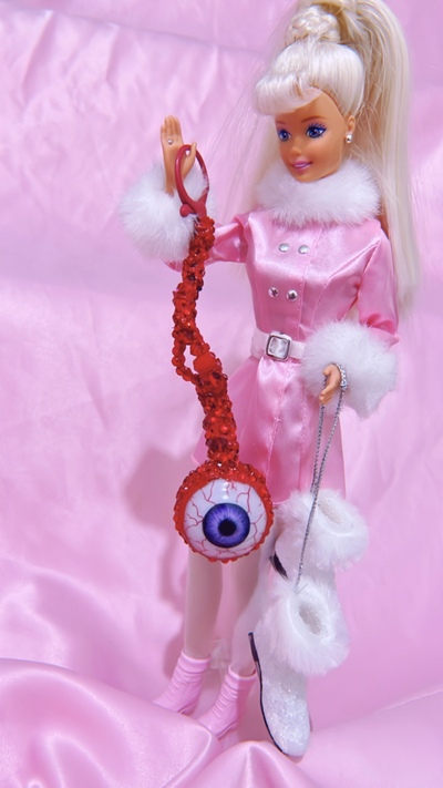 Purple Plucked Eye Bag Charm