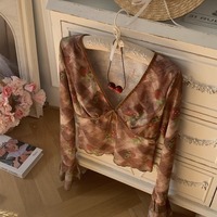 Deep V-neck blouse with bow detail and flared sleeves (a trendy and alluring style) - Thumbnail 2