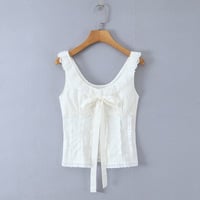 White shirt with a wide U-neck, lace trim, and bow tie detail. - Thumbnail 1