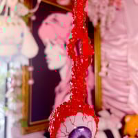 Purple Plucked Eye Bag Charm - Thumbnail 1