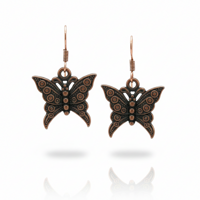 Copper butterfly charm earrings – handmade nature inspired jewelry with pure copper earwires