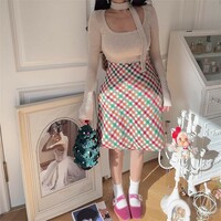 Retro high-waisted A-line skirt with colorful checkered pattern. - Thumbnail 4