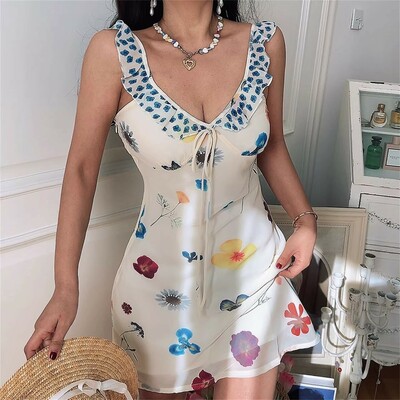 Beach vacation style, casual and sweet V-neck dress with a fitted waist.