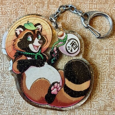 Tanuki sake keychain
