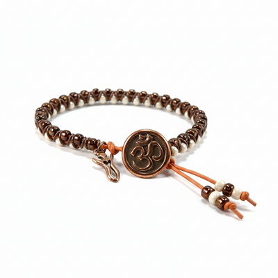 Orange & cream goddess bracelet – handmade jewelry with copper om charm
