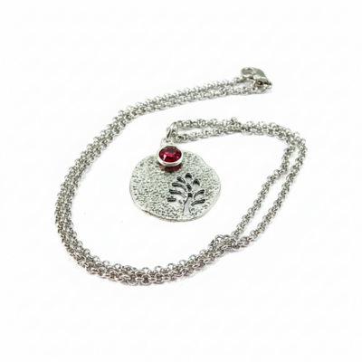January birthstone leaf pendant necklace - handmade silver leaf cutout with garnet crystal charm
