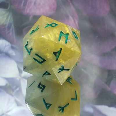 Bright gold rune dice