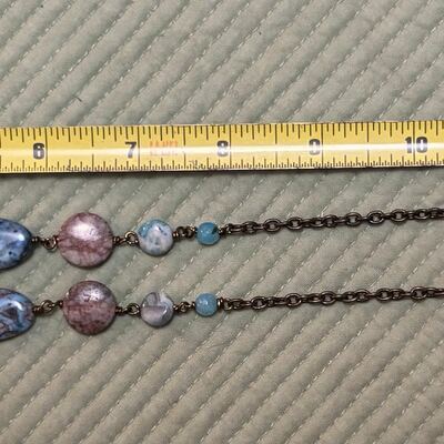 Blue winged eyeball necklace