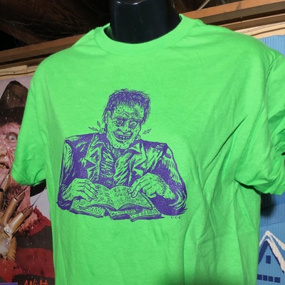 Green frankenstein reads t shirt by c. cilla
