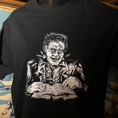 Black & white frankenstein reads t shirt by c. cilla