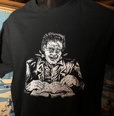 Black & White Frankenstein Reads T Shirt by C. Cilla