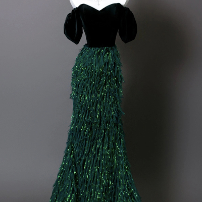 Off-the-shoulder sweetheart neckline velvet top emerald green sparkly fringe mermaid evening gown 