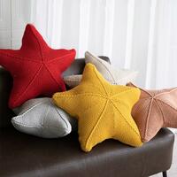 Starfish-shaped knitted cushions made with stuffing - Thumbnail 1