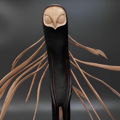 Wooden sculpture by tach pollard "owlman whispering" 