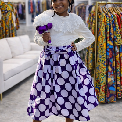 Young girl purple & white polka dot skirt set