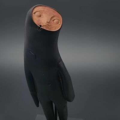 Wooden sculpture by tach pollard "wind walker" 
