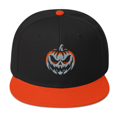 Black and orange embr. "komatose logo" snapback