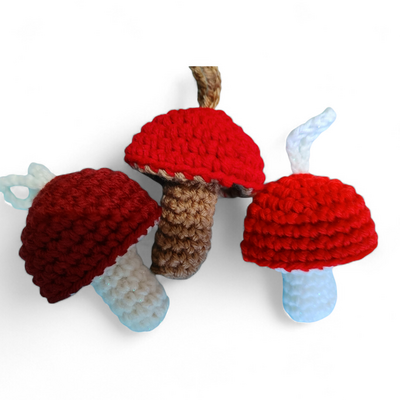 Whimsical crochet mushroom lip balm holder keychain