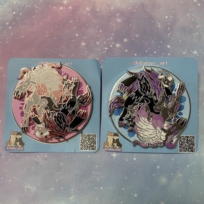 Illusion foxes spinning hard enamel pin