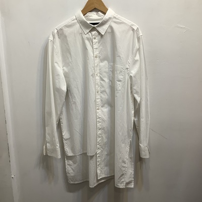 NOT CONVENTIONAL white asymmetrical hem shirt 