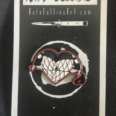 Bondage heart butt enamel pin