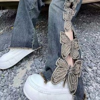Distressed butterfly embroidery jeans - Thumbnail 1