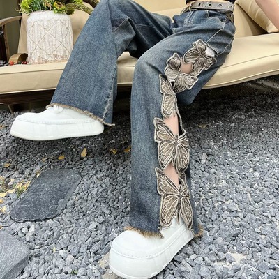 Distressed butterfly embroidery jeans
