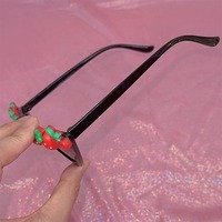 Black cat-eye party sunglasses decorated with small strawberry - Thumbnail 7