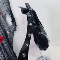 Y2K-style shoulder bag featuring a large studded bow - Thumbnail 5