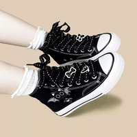 Black canvas high-top sneakers featuring bat wing attachments - Thumbnail 1