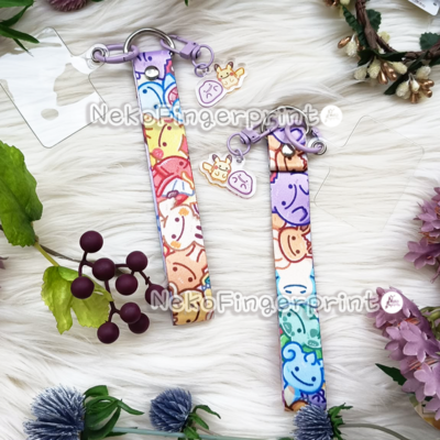 Ditto phone tether tab with lanyard and charm