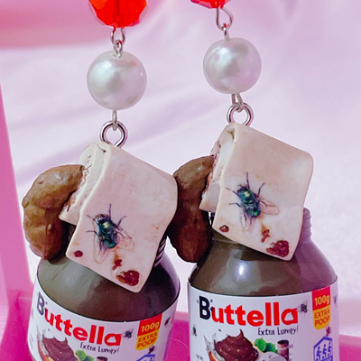 Buttella ear candy