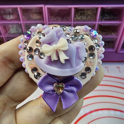 Purple rocking horse