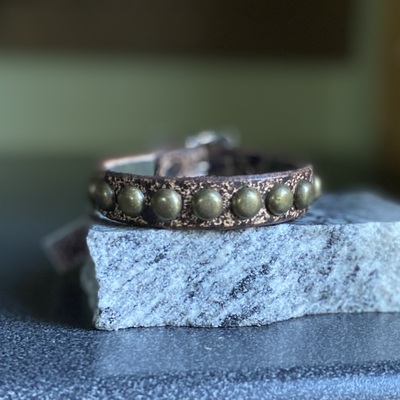 On-sale: premade black n tan splatter medium dome studs wristband - Thumbnail 1