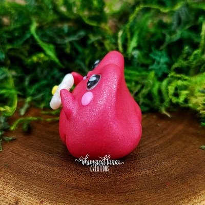 Red frog w/white flower