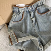 Vintage high-waisted denim shorts - Thumbnail 1