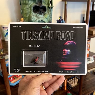 'tinsman road' miss crow figure