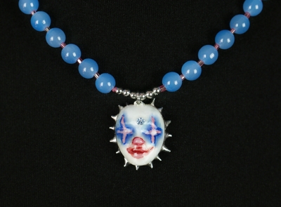 Handmade blue clown doll face necklace