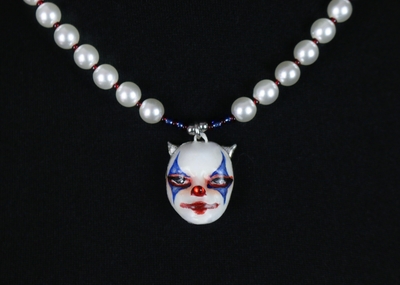 Handmade circus clown doll face necklace