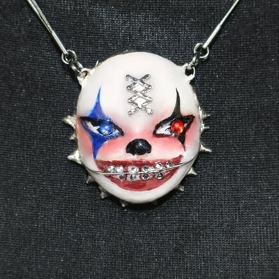 Handmade braces clown doll face necklace