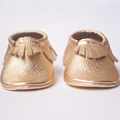 Metallic gold moccasins