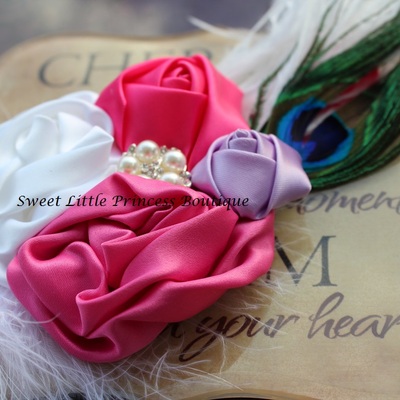 Pink, purple and white rosette and feather headband