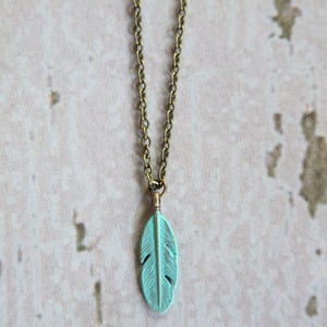 Gleeful Peacock Feather Charm Necklace