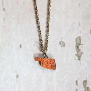 Gleeful Peacock Oklahoma Charm Necklace