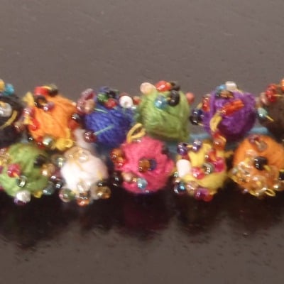 Sky color thread pom pom bracelet