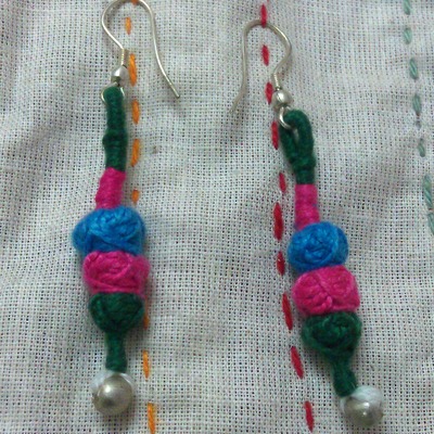 100 percent hand-made cotton pom pom earrings