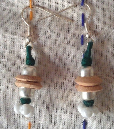 100 percent hand-made Wooden beads, cotton thread and beaded earrings