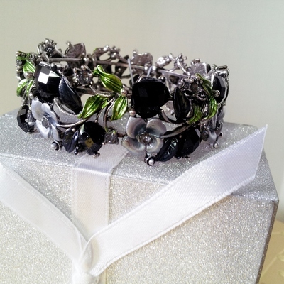 A wristful of flowers - lots of colors!