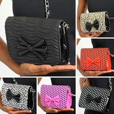 Bow cross body bags