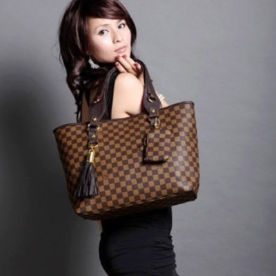 Grid single shoulder tassle bag